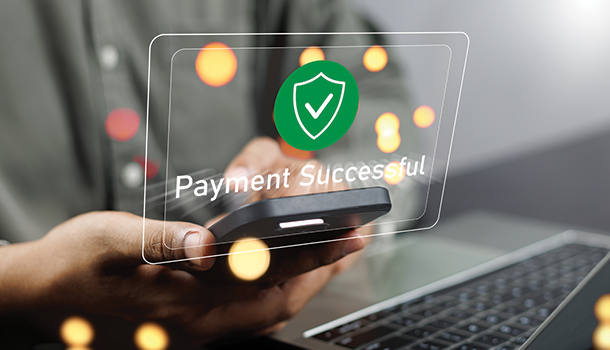 Man with phone mobile payment successful