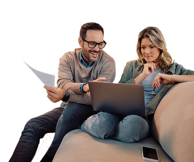 Couple on couch with laptop