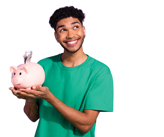 Male teen with piggy bank